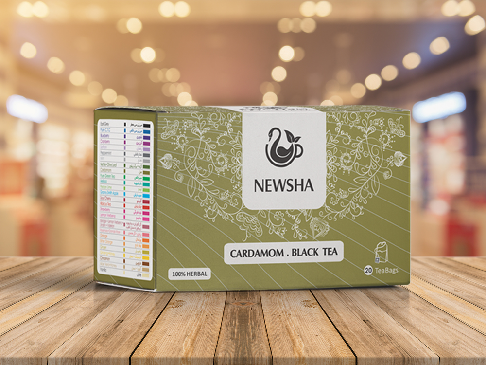 Box of Newsha Cardamom Black Tea with floral designs and a teacup logo. Features "100% Herbal" label, 20 teabags.