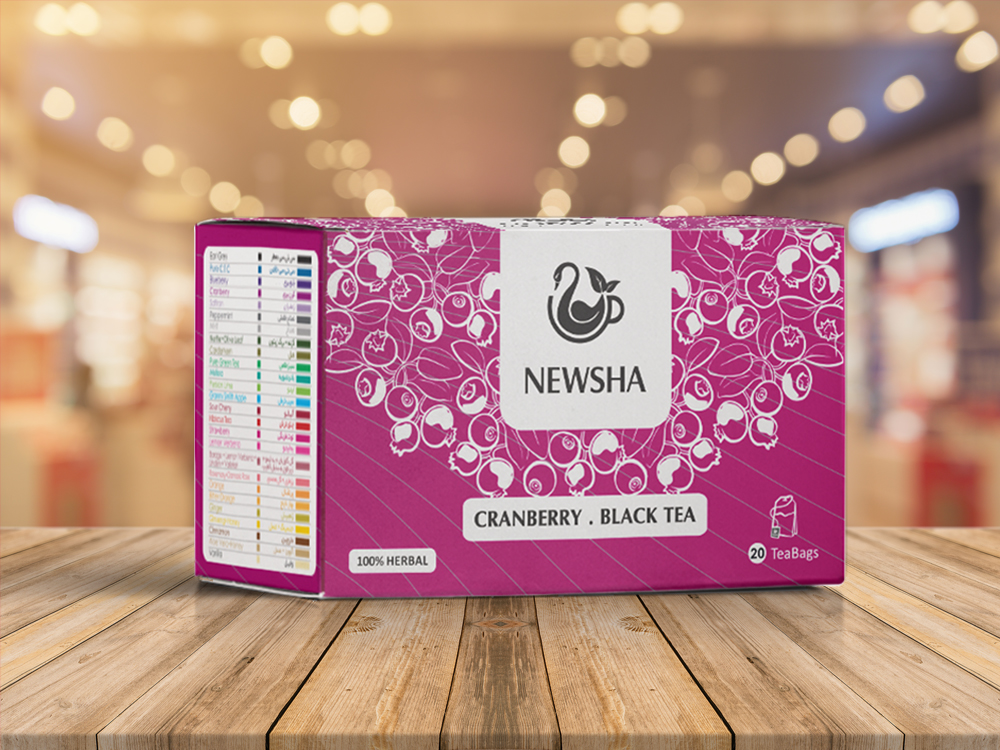 A purple box of Newsha Cranberry Black Tea featuring a tea cup logo, labeled "100% Herbal" and containing 20 tea bags.