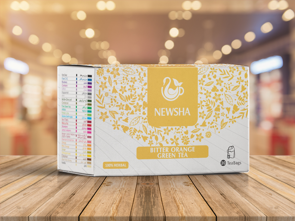 Box of Newsha Bitter Orange Green Tea with a yellow floral design and white background. Contains 20 tea bags, labeled 100% herbal on the front.