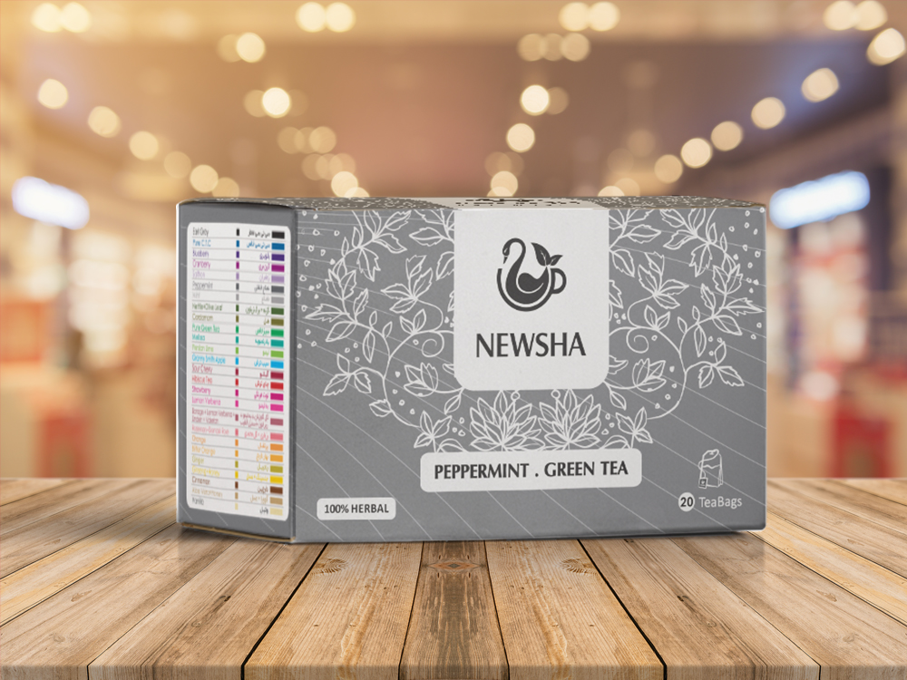 Gray box of Newsha peppermint green tea, decorated with white leaf patterns. Text: "100% herbal," "20 tea bags." Simple, elegant design.