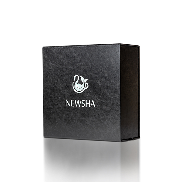 Black box with a textured finish, featuring a silver logo and the word "NEWSHA," reflecting elegance and premium quality.