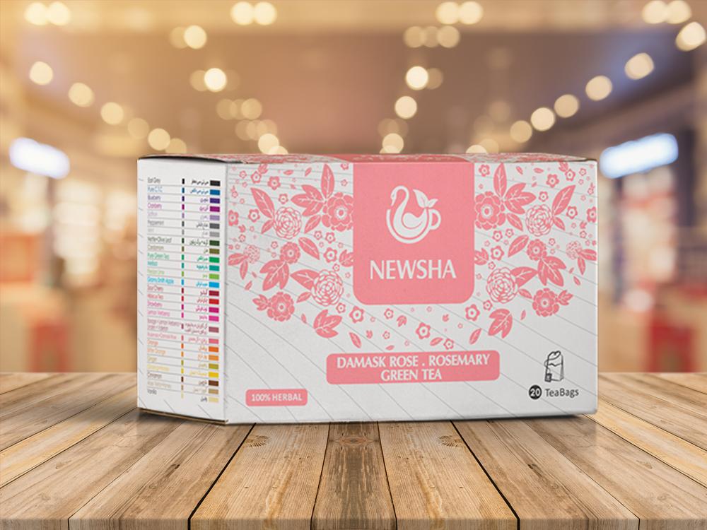 Box of Newsha Damask Rose and Rosemary Green Tea with pink floral design. The front displays the brand logo, tea type, and quantity of 20 tea bags.