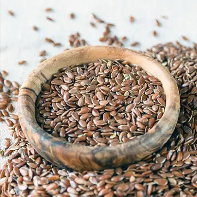 Flax seeds displayed in a bowl, highlighting their rich source of omega-3 fatty acids for a healthy diet.